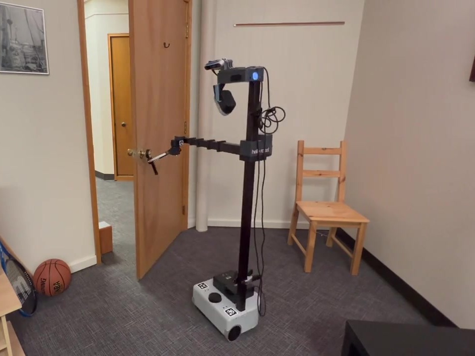 Mobile manipulator opening a door